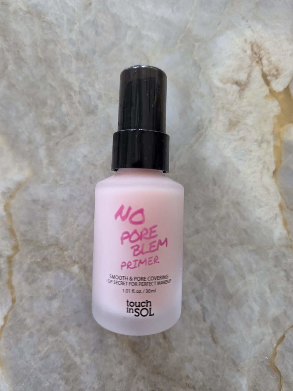 touch in SOL No Pore Blem Primer — soft pink bottle with black cap